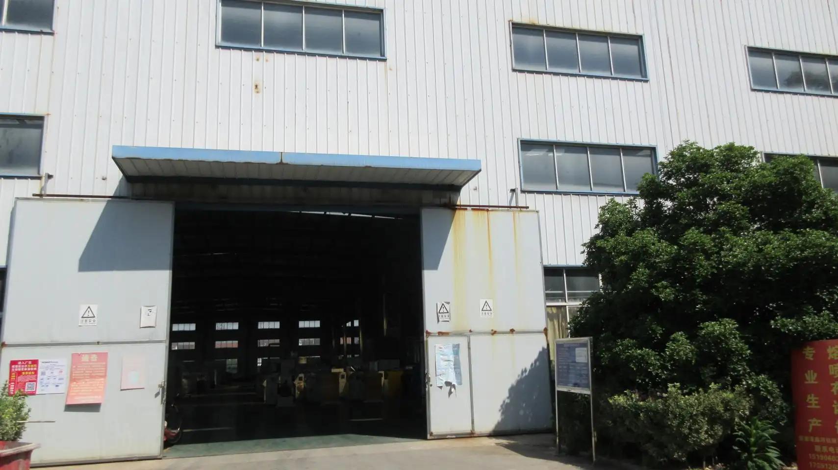 Zhangjiagang Xinhe Machinery Co., Ltd.